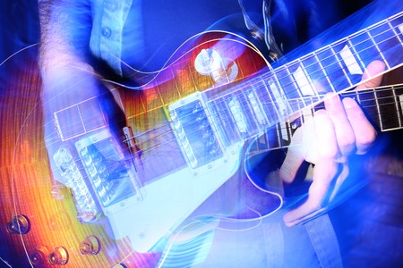 Rock n roll music, creativity, passion concept. Bright mixed photos of rock guitar in brutish hands...