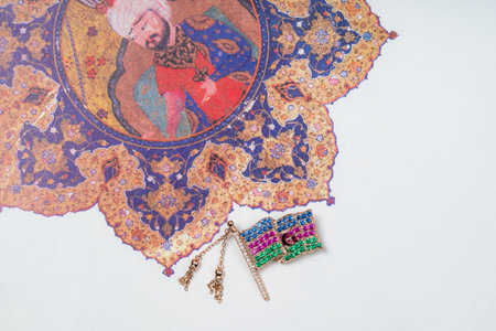 Azerbaijan gold flag lapel pin on ornament backgroundの写真素材