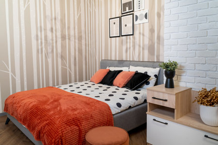 Cozy Bedroom Interior with Modern Decor and Comfortable Bedding