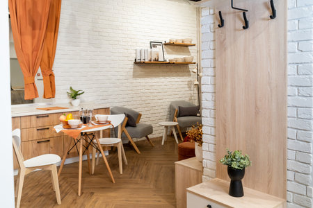 Cozy Kitchen Corner with Dining Table Setupの写真素材