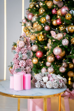 Festive Christmas Table with Pink Decorationsの写真素材
