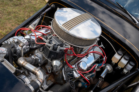 Classic Car Engine with Red Wiring and Chrome Details