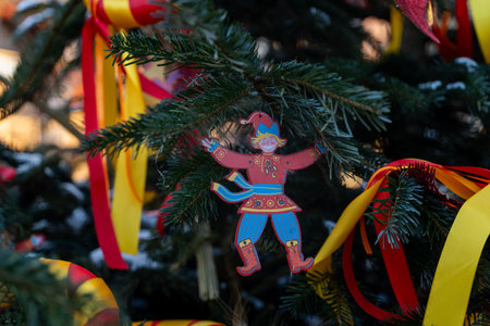 Festive Hanging Ornament on Tree with Colorful Ribbons