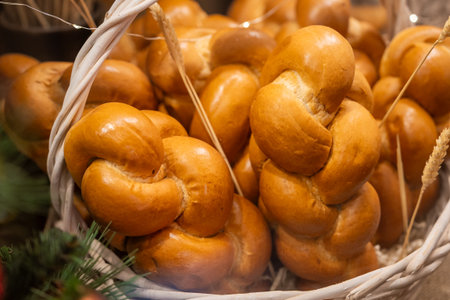 Freshly Baked Braided Bread in a Basket Displayの写真素材