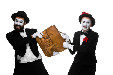 Two memes as business man and woman fighting over briefcase isolated on white background. の写真素材