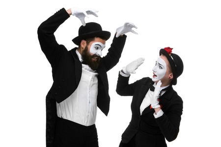Two memes as businessmen fighting, isolated on a white background. concept  of attack and submissionの写真素材