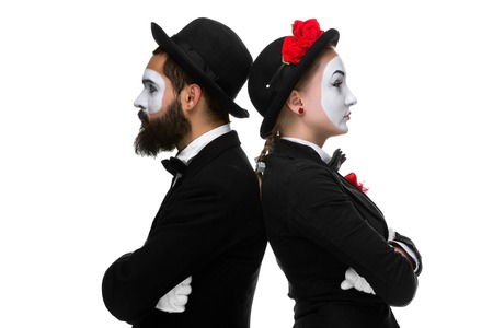 Two memes looking in different directions, isolated on a white background. concept  of confrontation and antagonismの写真素材