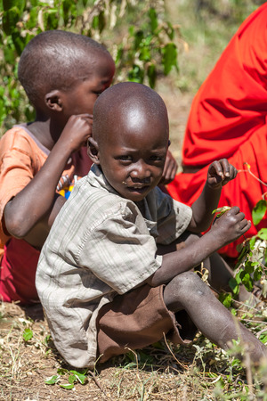 AMBOSELI, KENYA - Feb 12, 2010: Unidentified Massai children in Kenya, Feb 12, 2010. Massai people are a Nilotic ethnic groupのeditorial素材