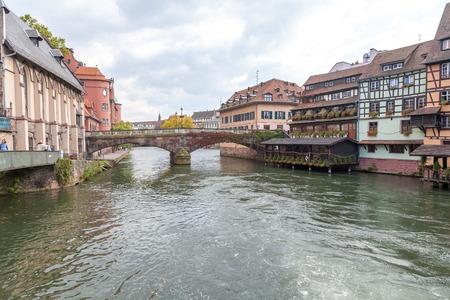 Strasbourg, water canal in Petite France area. timbered houses and trees in Grand Ile. Alsace,...