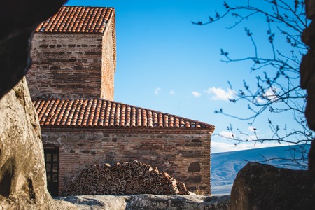 Ancient Orthodox Church in antique cave city Uplistsikhe, Georgia, Europe.の写真素材
