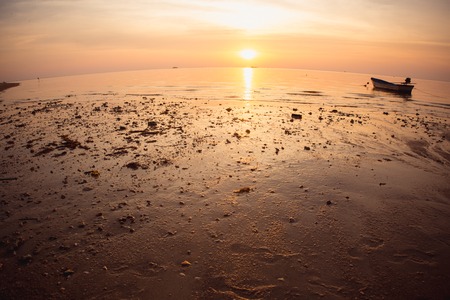 The sunset over the tropical beach. Thailandの写真素材