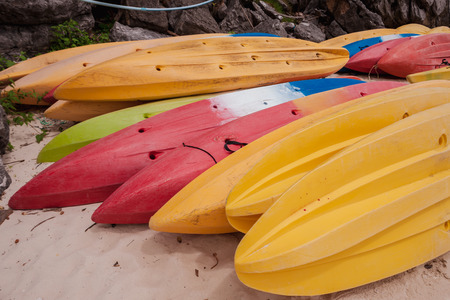 Colorful kayaks on beach in Andaman sea, Thailandの写真素材