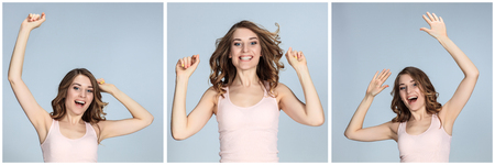 The collage of young woman's portrait with happy emotions on gray backgroundの写真素材