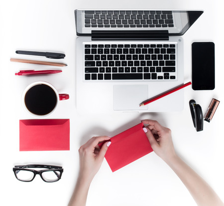 Concept of comfortable female workplaces. Gadgets on the white deskの写真素材