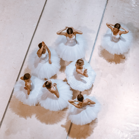 The top view of ballerinas on floor in the rehearsal hall of the theaterの写真素材