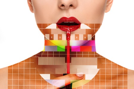 Beautiful female lips with red make-up and brush on white. Makeup artist working processの写真素材