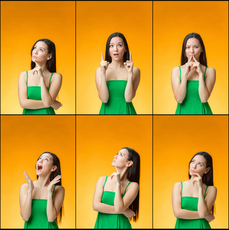 The young thinking Chinese girl on yellow backgroundの写真素材