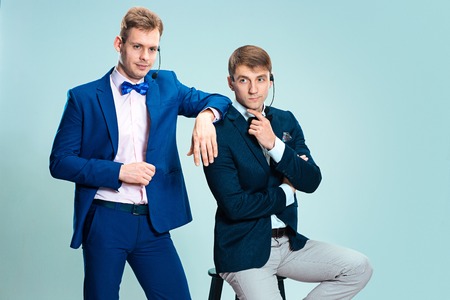 Portrait of a handsome customer service operator wearing a headsetの写真素材