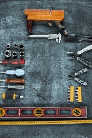 The set of construction tools on wooden tableの写真素材
