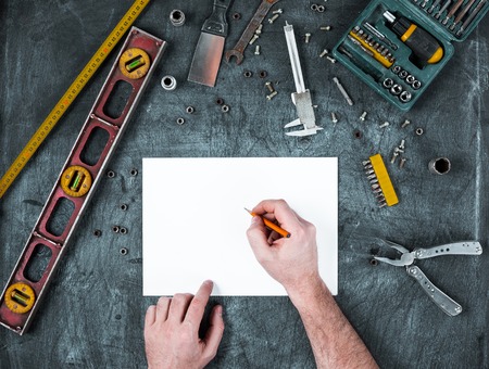 The set of construction tools on wooden tableの写真素材