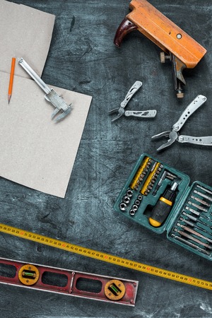 The set of construction tools on wooden tableの写真素材
