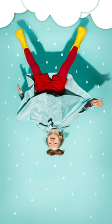 Little girl posing in fashion style wearing autumn clothing.の写真素材