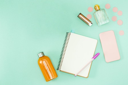 Coffee and personal items on desktopの写真素材