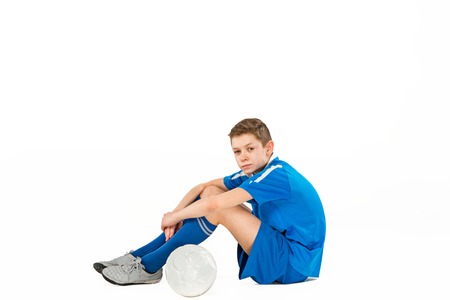 Young boy with soccer ballの写真素材