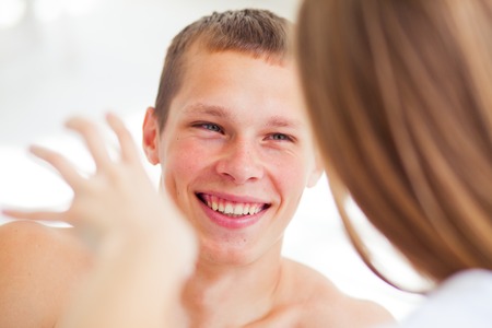 Lifestyle. Beautiful couple in bedの写真素材