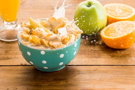 Healthy home made breakfast of muesli, apples, fresh fruits, walnuts. Served with fresh, sliced...