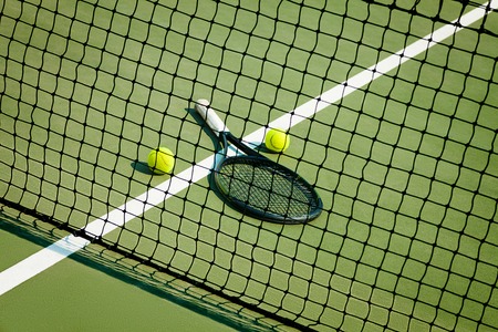 The green tennis ball on a tennis courtの写真素材