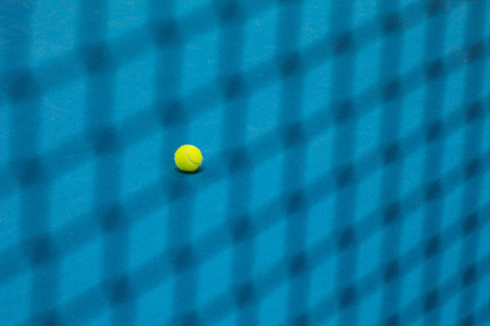The tennis ball on a tennis courtの写真素材