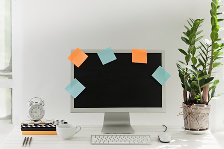 Stylish workspace with computer at home or studioの写真素材