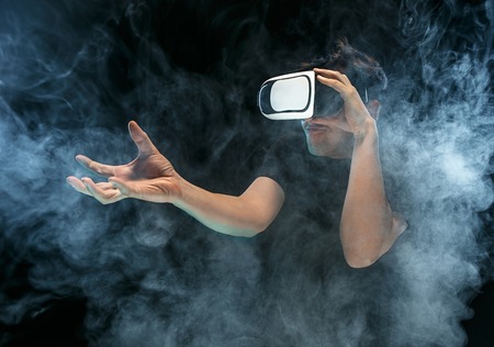 The man with glasses of virtual reality. Future technology concept.