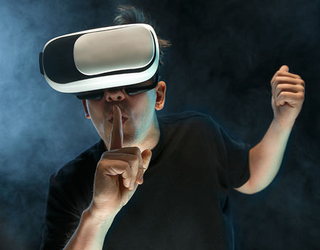 The man with glasses of virtual reality. Future technology concept.の写真素材