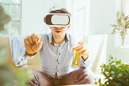 The man with glasses of virtual reality. Future technology concept.の写真素材