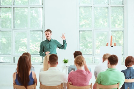 Speaker at Business Meeting in the conference hall.
