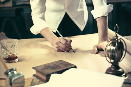 Architect working on drawing table in office