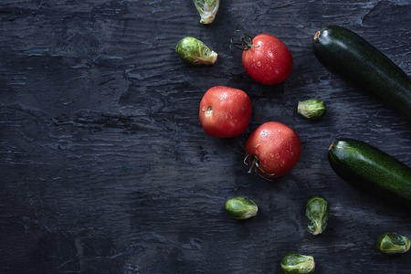 Organic vegetables on wooden table. Top viewの写真素材