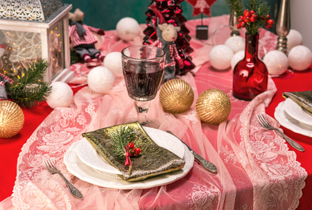 Beautiful Christmas table setting with decorationsの写真素材