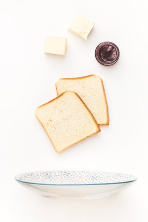 The falling ingredients of fried toastes. Healthy breakfast ingredients.