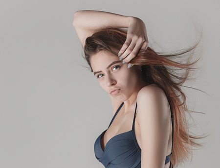 face of a beautiful young girl with a clean fresh face close upの写真素材