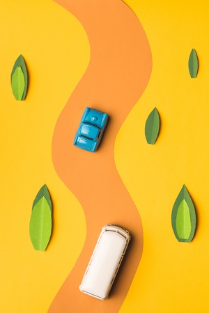 Vintage miniature car and bus in trendy color, travel conceptの写真素材
