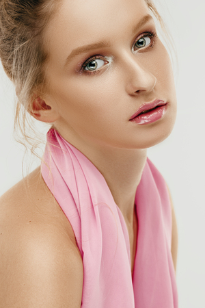 Beauty face of young fashion model woman with bright eyes and lipsの写真素材