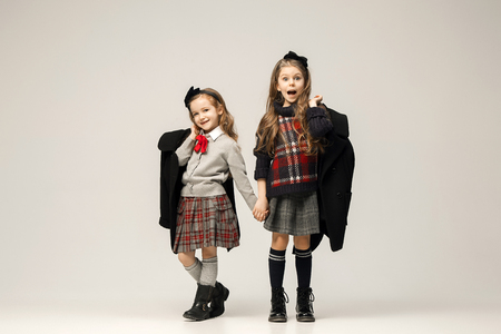 The fashion portrait of young beautiful teen girls at studioの写真素材