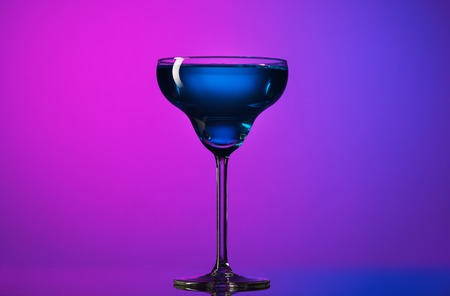 The wine glasses standing on the table at studioの写真素材