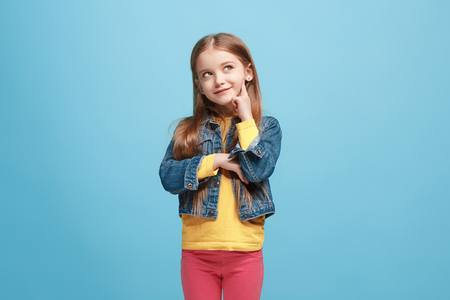 Young serious thoughtful teen girl. Doubt concept.の写真素材