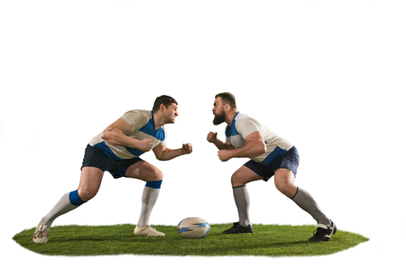 The silhouette of two caucasian rugby man player isolated on white backgroundの写真素材