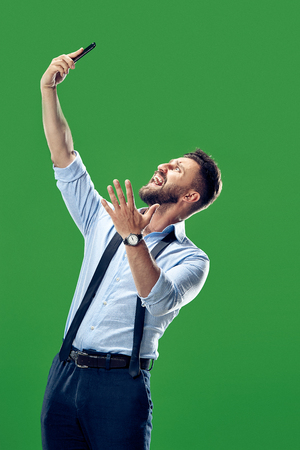 Handsome businessman with mobile phoneの写真素材