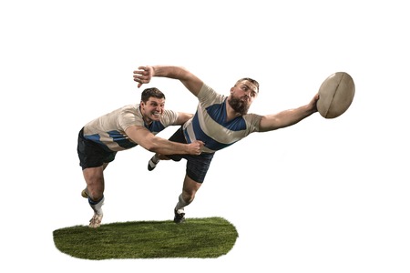 The silhouette of two caucasian rugby man player isolated on white backgroundの写真素材
